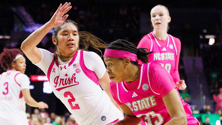 NC State guard Zoe Brooks (35) drives to the basket against Notre Dame guard Vanessa de Jesus (2) during an NCAA women's basketball game at Purcell Pavilion on Sunday, Feb. 15, 2026, in South Bend.