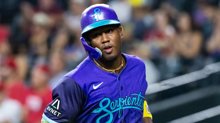 Aug 24, 2025; Phoenix, Arizona, USA; Arizona Diamondbacks infielder Geraldo Perdomo scores in the first inning triple against the Cincinnati Reds at Chase Field. Mandatory Credit: Mark J. Rebilas-Imagn Images Aug 24, 2025; Phoenix, Arizona, USA; Arizona Diamondbacks infielder Geraldo Perdomo scores in the first inning triple against the Cincinnati Reds at Chase Field. Mandatory Credit: Mark J. Rebilas-Imagn Images