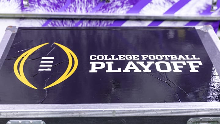Jan 1, 2024; New Orleans, LA, USA; A general view of the College Football Playoff logo on a case on the Washington Huskies sideline before the 2024 Sugar Bowl college football playoff semifinal game between the Texas Longhorns and the Washington Huskies at Caesars Superdome. 