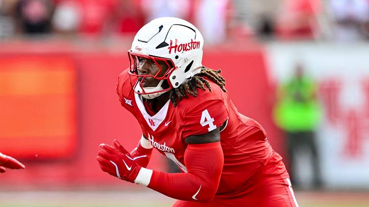 Oct 18, 2025; Houston, Texas, USA; Houston Cougars defensive end Brandon Mack (4) defends in coverage during the first half against the Arizona Wildcats at TDECU Stadium. Mandatory Credit: Maria Lysaker-Imagn Images Oct 18, 2025; Houston, Texas, USA; Houston Cougars defensive end Brandon Mack (4) defends in coverage during the first half against the Arizona Wildcats at TDECU Stadium. Mandatory Credit: Maria Lysaker-Imagn Images