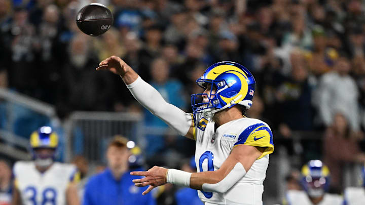 Jan 10, 2026; Charlotte, NC, USA; Los Angeles Rams quarterback Matthew Stafford (9) drops back to pass against the Carolina Panthers in the first half during the NFC Wild Card Round game at Bank of America Stadium. Mandatory Credit: Bob Donnan-Imagn Images
