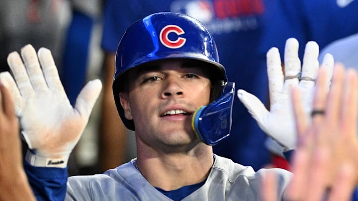 Chicago Cubs third baseman Matt Shaw (8) celebrates with teammates after hitting a solo home run against the Toronto Blue Jays at Rogers Centre. 