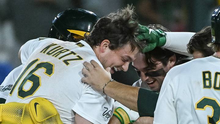 Jun 19, 2026; West Sacramento, California, USA; Athletics first baseman Nick Kurtz (16) celebrates with teammates after drawing a walk to win the game against the Los Angeles Angels at Sutter Health Park. Mandatory Credit: Ed Szczepanski-Imagn Images Jun 19, 2026; West Sacramento, California, USA; Athletics first baseman Nick Kurtz (16) celebrates with teammates after drawing a walk to win the game against the Los Angeles Angels at Sutter Health Park. Mandatory Credit: Ed Szczepanski-Imagn Images