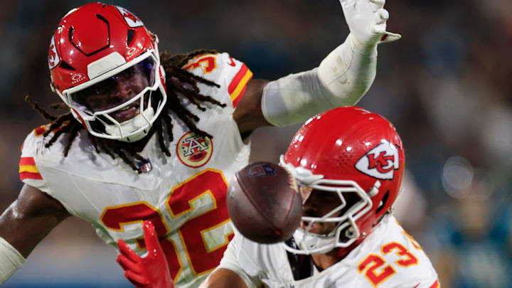 Kansas City Chiefs linebacker Nick Bolton (32) and linebacker Drue Tranquill (23) can’t intercept a bobbled pass during the second quarter of an NFL football matchup at EverBank Stadium, Monday, Oct. 6, 2025, in Jacksonville, Fla. [Corey Perrine/Florida Times-Union]
