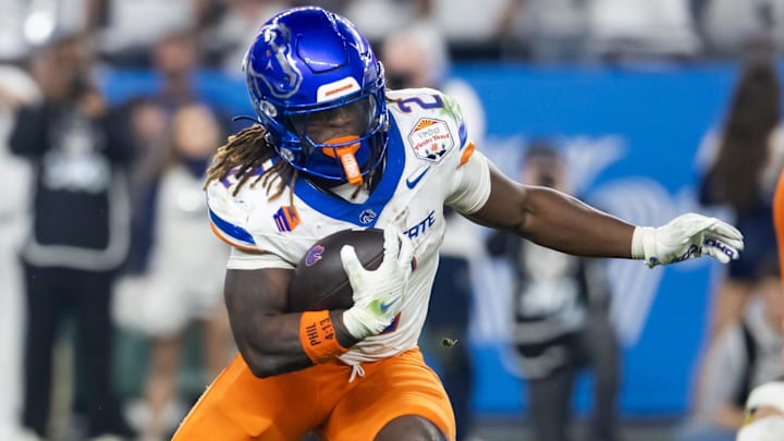 Dec 31, 2024; Glendale, AZ, USA; Boise State Broncos running back Ashton Jeanty (2) against the Penn State Nittany Lions during the Fiesta Bowl at State Farm Stadium. Mandatory Credit: Mark J. Rebilas-Imagn Images