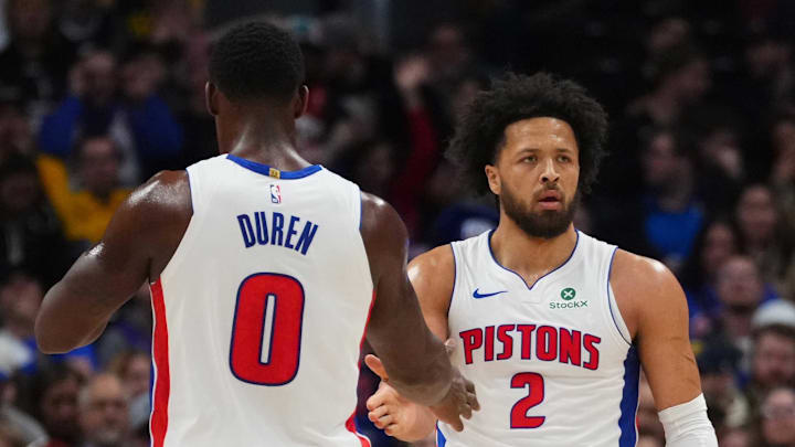 Jan 27, 2026; Denver, Colorado, USA; Detroit Pistons guard Cade Cunningham (2) and center Jalen Duren (0) react to a foul called in the first quarter against the Denver Nuggets at Ball Arena. Mandatory Credit: Ron Chenoy-Imagn Images