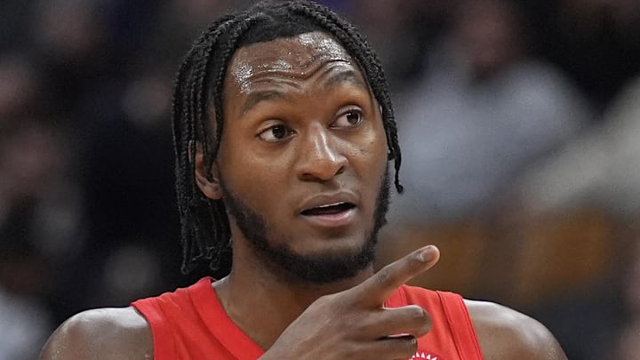 Toronto Raptors guard Immanuel Quickley gestures to a team mate during the second half against the Houston Rockets. Toronto Raptors guard Immanuel Quickley gestures to a team mate during the second half against the Houston Rockets.