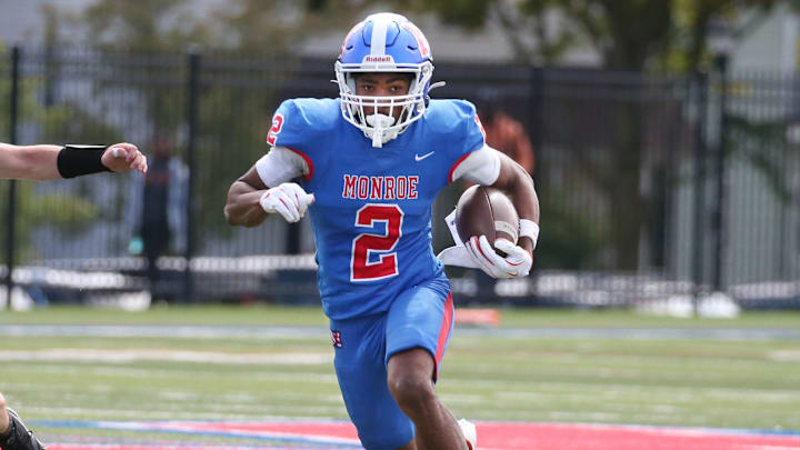 Monroe wide receiver Messiah Hampton flies upfield for yards after the catch in the first half during their season opening game Saturday, Sept. 7, 2024 at Monroe High School. Monroe wide receiver Messiah Hampton flies upfield for yards after the catch in the first half during their season opening game Saturday, Sept. 7, 2024 at Monroe High School.