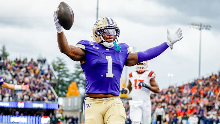 October 25, 2025, Seattle, Washington, USA: Washington Huskies running back Jonah Coleman (1) scores during the game between the Illinois Fighting Illini and the Washington Huskies in the 2025 Big 10 Conference game at Husky Stadium, Seattle, Washington.