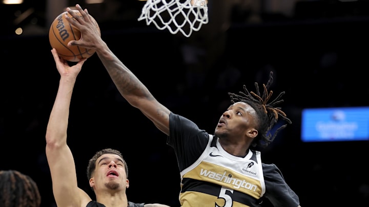 Feb 7, 2026; Brooklyn, New York, USA; Washington Wizards guard Jamir Watkins (5) blocks a shot by Brooklyn Nets forward Michael Porter Jr. (17) during the fourth quarter at Barclays Center. Mandatory Credit: Brad Penner-Imagn Images Feb 7, 2026; Brooklyn, New York, USA; Washington Wizards guard Jamir Watkins (5) blocks a shot by Brooklyn Nets forward Michael Porter Jr. (17) during the fourth quarter at Barclays Center. Mandatory Credit: Brad Penner-Imagn Images