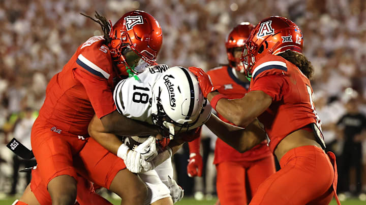Sep 27, 2025; Ames, Iowa, USA; Iowa State Cyclones tight end Benjamin Brahmer (18) catches a pass in front of Arizona Wildcats defensive back Marquis Groves-Killebrew (5) during the first half at Jack Trice Stadium. Mandatory Credit: Reese Strickland-Imagn Images Sep 27, 2025; Ames, Iowa, USA; Iowa State Cyclones tight end Benjamin Brahmer (18) catches a pass in front of Arizona Wildcats defensive back Marquis Groves-Killebrew (5) during the first half at Jack Trice Stadium. Mandatory Credit: Reese Strickland-Imagn Images