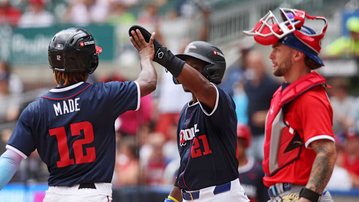 National League outfielder Josue De Paula (46) of the Los Angeles Dodgers scores a run during the sixth inning against American League at Truist Park on July 12.