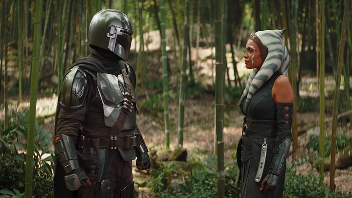 (L-R): The Mandalorian (Pedro Pascal) and Ahsoka Tano (Rosario Dawson) in Lucasfilm's THE BOOK OF BOBA FETT, exclusively on Disney+. (L-R): The Mandalorian (Pedro Pascal) and Ahsoka Tano (Rosario Dawson) in Lucasfilm's THE BOOK OF BOBA FETT, exclusively on Disney+.