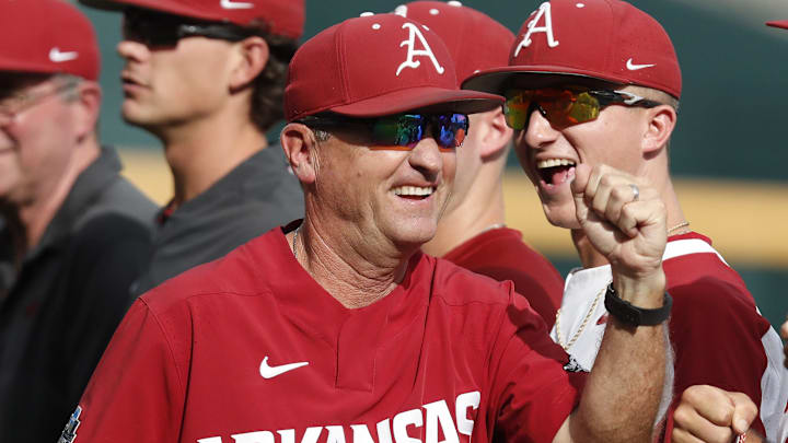 Arkansas Razorbacks head coach Dave Van Horn greets his players prior to the game against the Florida State Seminoles in the 2019 College World Series at TD Ameritrade Park. Arkansas Razorbacks head coach Dave Van Horn greets his players prior to the game against the Florida State Seminoles in the 2019 College World Series at TD Ameritrade Park.