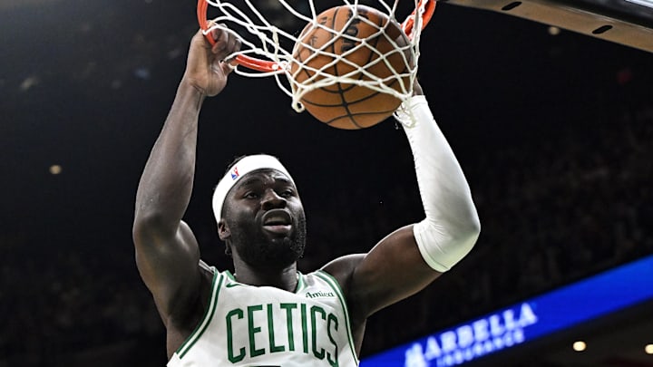 Oct 12, 2025; Boston, Massachusetts, USA; Boston Celtics center Neemias Queta (88) dunks the ball against the Cleveland Cavaliers during the first half at TD Garden.