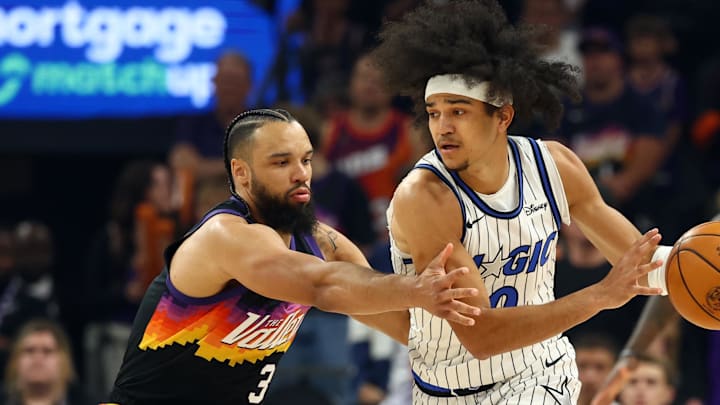 Feb 21, 2026; Phoenix, Arizona, USA; Phoenix Suns forward Dillon Brooks (3) defends against Orlando Magic guard Anthony Black (0) in the first half at Mortgage Matchup Center. Mandatory Credit: Mark J. Rebilas-Imagn Images
