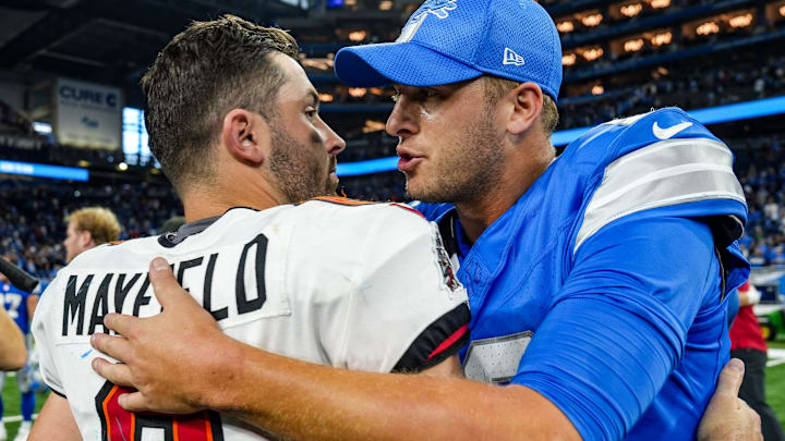 Tampa Bay Buccaneers quarterback Baker Mayfield (6) hugs Detroit Lions quarterback Jared Goff (16) Tampa Bay Buccaneers quarterback Baker Mayfield (6) hugs Detroit Lions quarterback Jared Goff (16)