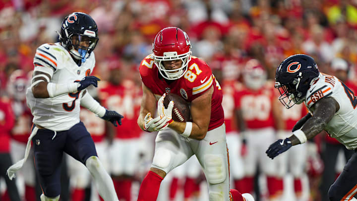 Aug 22, 2025; Kansas City, Missouri, USA; Kansas City Chiefs tight end Travis Kelce (87) runs with the ball against Chicago Bears safety Jaquan Brisker (9) and linebacker Ruben Hyppolite II (47) during the first half at GEHA Field at Arrowhead Stadium. Mandatory Credit: Jay Biggerstaff-Imagn Images Aug 22, 2025; Kansas City, Missouri, USA; Kansas City Chiefs tight end Travis Kelce (87) runs with the ball against Chicago Bears safety Jaquan Brisker (9) and linebacker Ruben Hyppolite II (47) during the first half at GEHA Field at Arrowhead Stadium. Mandatory Credit: Jay Biggerstaff-Imagn Images