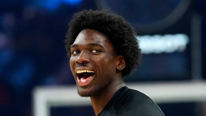Suns forward Rasheer Fleming (20) laughs with his teammates prior to a game against the Bucks at the Mortgage Matchup Center in Phoenix on March 21, 2026. Suns forward Rasheer Fleming (20) laughs with his teammates prior to a game against the Bucks at the Mortgage Matchup Center in Phoenix on March 21, 2026.