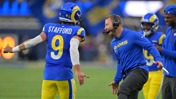 Jan 4, 2026; Inglewood, California, USA; Los Angeles Rams head coach Sean McVay reacts with quarterback Matthew Stafford (9) after a touchdown against the Arizona Cardinals during the second half at SoFi Stadium. Mandatory Credit: Jayne Kamin-Oncea-Imagn Images Jan 4, 2026; Inglewood, California, USA; Los Angeles Rams head coach Sean McVay reacts with quarterback Matthew Stafford (9) after a touchdown against the Arizona Cardinals during the second half at SoFi Stadium. Mandatory Credit: Jayne Kamin-Oncea-Imagn Images