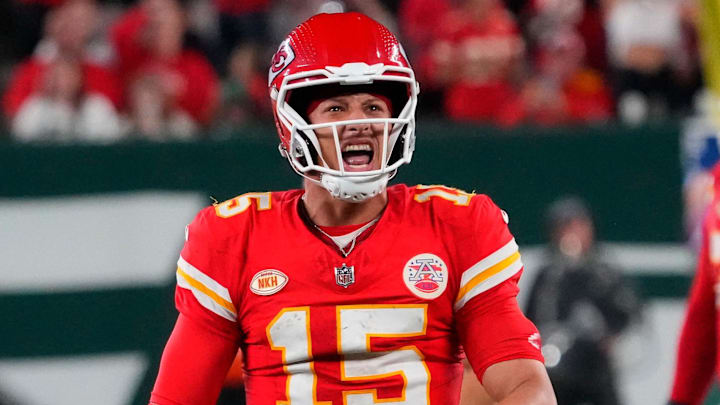 Oct 1, 2023; East Rutherford, New Jersey, USA; Kansas City Chiefs quarterback Patrick Mahomes (15) celebrates a 4th quarter keeper for a 1st down against the Jets at MetLife Stadium. Mandatory Credit: Robert Deutsch-Imagn Images