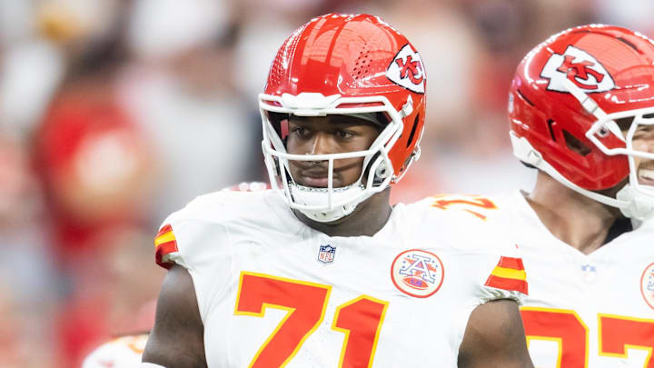 Aug 9, 2025; Glendale, Arizona, USA; Kansas City Chiefs offensive tackle Josh Simmons (71) against the Arizona Cardinals during a preseason NFL game at State Farm Stadium. Mandatory Credit: Mark J. Rebilas-Imagn Images