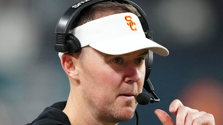 Dec 27, 2024; Las Vegas, NV, USA; Southern California Trojans head coach Lincoln Riley reacts against the Texas A&M Aggies in the second half at Allegiant Stadium. Mandatory Credit: Kirby Lee-Imagn Images Dec 27, 2024; Las Vegas, NV, USA; Southern California Trojans head coach Lincoln Riley reacts against the Texas A&M Aggies in the second half at Allegiant Stadium. Mandatory Credit: Kirby Lee-Imagn Images