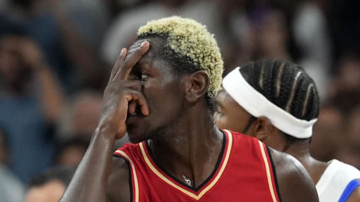 Germany point guard Isaac Bonga (0) celebrates after a three point shot against France in the second half in a men’s group B basketball game during the Paris 2024 Olympic Summer Games at Stade Pierre-Mauroy on August 2, 2024.