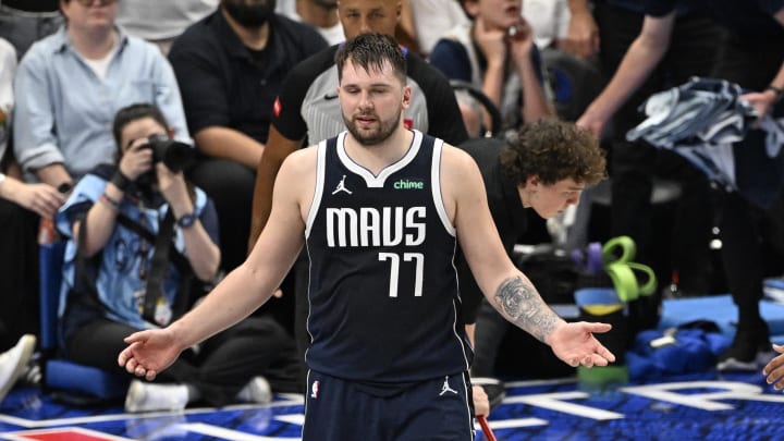 Jun 12, 2024; Dallas, Texas, USA; Dallas Mavericks guard Luka Doncic (77) reacts after fouling out during the fourth quarter in game three of the 2024 NBA Finals against the Boston Celtics at American Airlines Center. Mandatory Credit: Jerome Miron-USA TODAY Sports Jun 12, 2024; Dallas, Texas, USA; Dallas Mavericks guard Luka Doncic (77) reacts after fouling out during the fourth quarter in game three of the 2024 NBA Finals against the Boston Celtics at American Airlines Center. Mandatory Credit: Jerome Miron-USA TODAY Sports