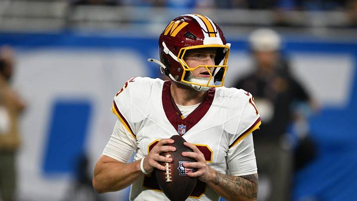 Aug 22, 2026; Detroit, Michigan, USA; Washington Commanders quarterback Athan Kaliakmanis (16) looks to pass against the Detroit Lions at Ford Field. Mandatory Credit: Lon Horwedel-Imagn Images