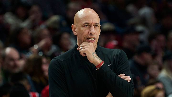 Apr 12, 2026; Portland, Oregon, USA; Sacramento Kings head coach Doug Christie watches the game from court side during the second half in a game against the Portland Trail Blazers at Moda Center. Apr 12, 2026; Portland, Oregon, USA; Sacramento Kings head coach Doug Christie watches the game from court side during the second half in a game against the Portland Trail Blazers at Moda Center.