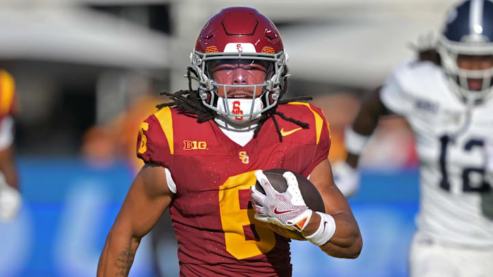 Sep 6, 2025; Los Angeles, California, USA; USC Trojans wide receiver Makai Lemon (6) runs down field for a touchdown on a pass play during the first half against the Georgia Southern Eagles at the Los Angeles Memorial Coliseum. Mandatory Credit: Jayne Kamin-Oncea-Imagn Images Sep 6, 2025; Los Angeles, California, USA; USC Trojans wide receiver Makai Lemon (6) runs down field for a touchdown on a pass play during the first half against the Georgia Southern Eagles at the Los Angeles Memorial Coliseum. Mandatory Credit: Jayne Kamin-Oncea-Imagn Images