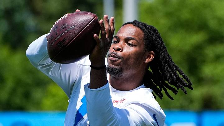 Detroit Lions safety Thomas Harper (12) warms up during OTAs at team's Performance Center in Allen Park. Detroit Lions safety Thomas Harper (12) warms up during OTAs at team's Performance Center in Allen Park.