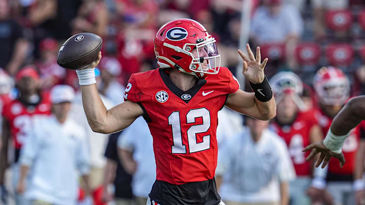 Aug 30, 2025; Athens, Georgia, USA; Georgia Bulldogs quarterback Ryan Puglisi (12) passes  against the Marshall Thundering Herd at Sanford Stadium. Mandatory Credit: Dale Zanine-Imagn Images