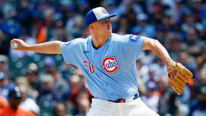 Chicago Cubs starting pitcher Jameson Taillon (50) delivers a pitch