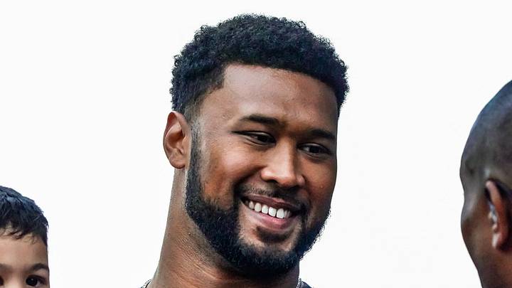 Former Indianapolis Colts player DeForest Buckner smiles