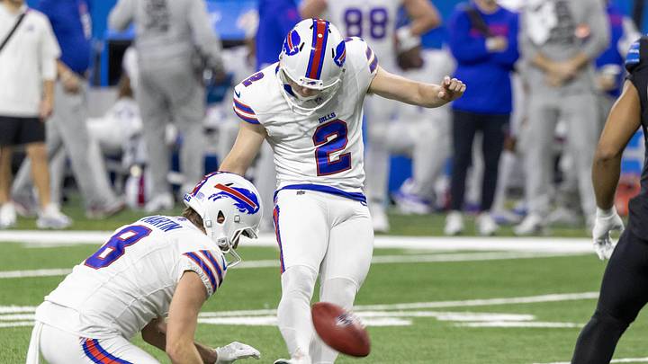 Dec 15, 2024; Detroit, Michigan, USA; Buffalo Bills place kicker Tyler Bass (2) kicks an extra point against the Detroit Lions during the first quarter at Ford Field. Dec 15, 2024; Detroit, Michigan, USA; Buffalo Bills place kicker Tyler Bass (2) kicks an extra point against the Detroit Lions during the first quarter at Ford Field.