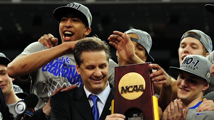 Coach John Calipari shown celebrating with his Kentucky Wildcats as he's presented with the NCAA national championship trophy after 67-59 victory over the Kansas Jayhawks in the finals of the Final Four nearly 13 years ago at the Mercedes-Benz Superdome in New Orleans on April 2, 2012.