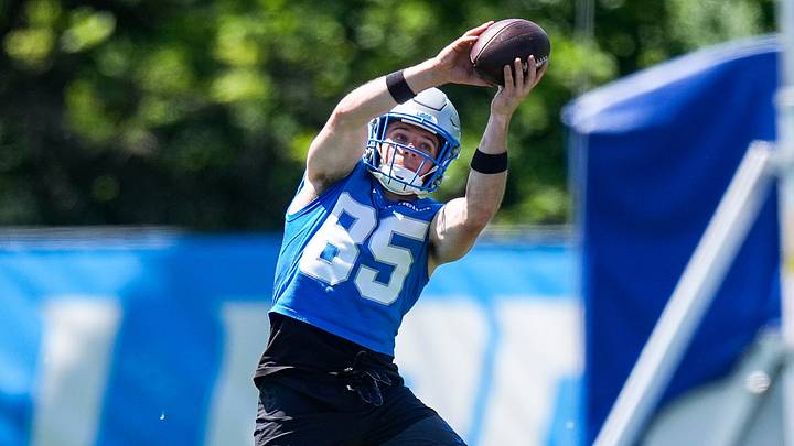 Detroit Lions wide receiver Tom Kennedy (85) practices a drill during OTAs at Allen Park Performance Center 