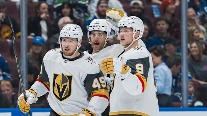 Apr 6, 2025; Vancouver, British Columbia, CAN; Vegas Golden Knights forward Ivan Barbashev (49) and defenseman Noah Hanifin (15) and forward Jack Eichel (9) celebrate Barbashev’s goal against the Vegas Golden Knights in the first period at Rogers Arena. Mandatory Credit: Bob Frid-Imagn Images