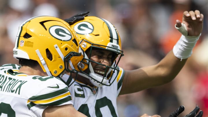 Green Bay Packers tight end John FitzPatrick (86) celebrates a touchdown with quarterback Jordan Love at Cleveland.