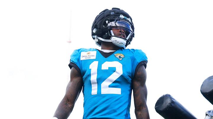 Jacksonville Jaguars wide receiver/cornerback Travis Hunter (12) is coached by wide receivers coach Edgar Bennett during the fifth day of NFL training camp at the Miller Electric Center on Monday, Aug. 3, 2026, in Jacksonville, Fla. Today marked the first full‑pads practice. 