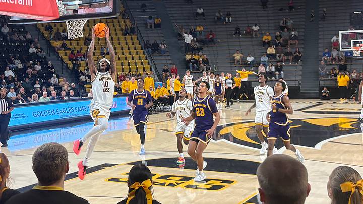 Southern Miss guard Isaac Taveras (10) rises up for a dunk in transition during an exhibition against LSU-New Orleans on Wednesday, Oct. 21, 2026. Southern Miss guard Isaac Taveras (10) rises up for a dunk in transition during an exhibition against LSU-New Orleans on Wednesday, Oct. 21, 2026.