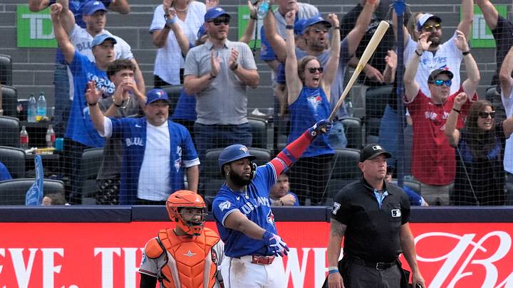 Sep 13, 2026; Toronto, Ontario, CAN;  Toronto Blue Jays first baseman Vladimir Guerrero Jr. (27) watches his first home run of the season at Rogers Centre go over the the left field wall during the fifth inning against the Baltimore Orioles.  Mandatory Credit: John E. Sokolowski-Imagn Images