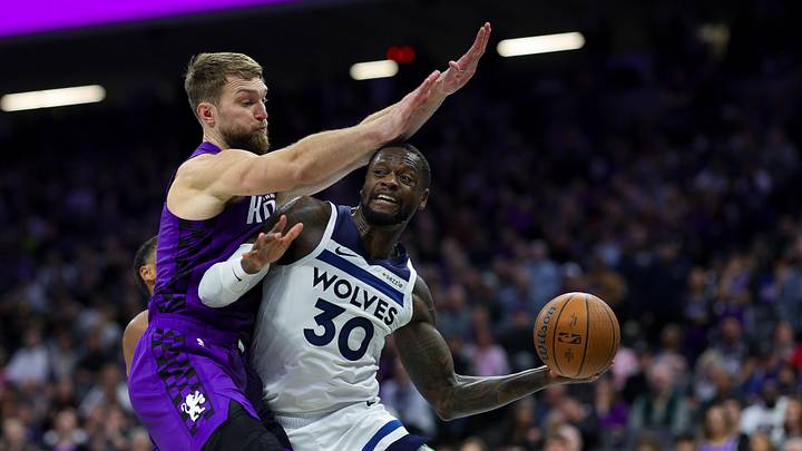 Nov 15, 2024; Sacramento, California, USA; Minnesota Timberwolves forward Julius Randle (30) passes the ball against Sacramento Kings forward Domantas Sabonis (11) during the fourth quarter at Golden 1 Center. Mandatory Credit: Sergio Estrada-Imagn Images Nov 15, 2024; Sacramento, California, USA; Minnesota Timberwolves forward Julius Randle (30) passes the ball against Sacramento Kings forward Domantas Sabonis (11) during the fourth quarter at Golden 1 Center. Mandatory Credit: Sergio Estrada-Imagn Images