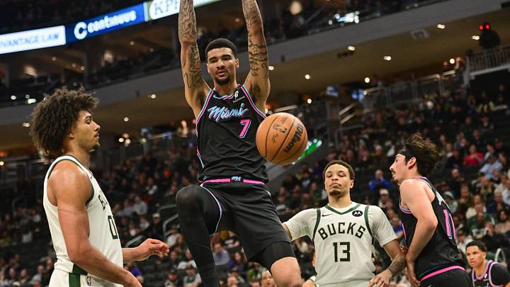 Feb 24, 2026; Milwaukee, Wisconsin, USA; Miami Heat center Kel'el Ware (7) dunks the ball against Milwaukee Bucks center Jericho Sims (00) and guard Ryan Rollins (13) in the third quarter at Fiserv Forum. Mandatory Credit: Benny Sieu-Imagn Images Feb 24, 2026; Milwaukee, Wisconsin, USA; Miami Heat center Kel'el Ware (7) dunks the ball against Milwaukee Bucks center Jericho Sims (00) and guard Ryan Rollins (13) in the third quarter at Fiserv Forum. Mandatory Credit: Benny Sieu-Imagn Images