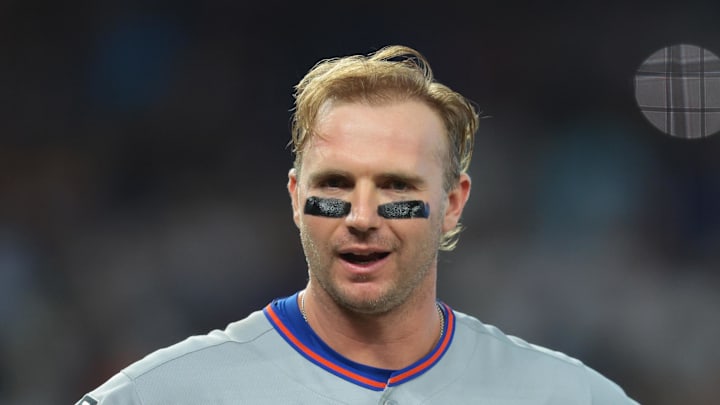 Sep 28, 2025; Miami, Florida, USA; New York Mets first baseman Pete Alonso (20) reacts while standing next to shortstop Francisco Lindor (12) after his at bat against the Miami Marlins during the fifth inning at loanDepot Park. Mandatory Credit: Sam Navarro-Imagn Images