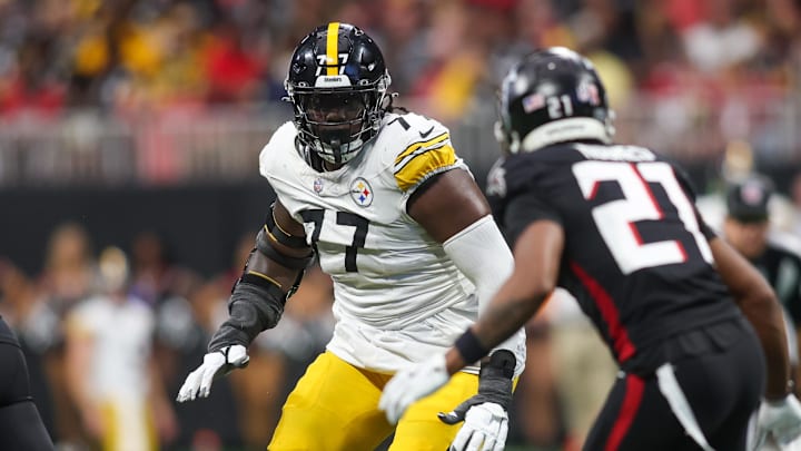 Sep 8, 2024; Atlanta, Georgia, USA; Pittsburgh Steelers offensive tackle Broderick Jones (77) blocks against the Atlanta Falcons in the fourth quarter at Mercedes-Benz Stadium. Mandatory Credit: Brett Davis-Imagn Images