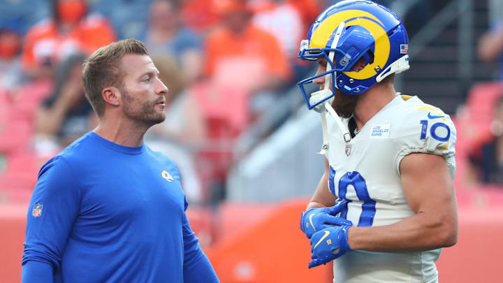 Aug 28, 2021; Denver, Colorado, USA; Los Angeles Rams head coach Sean McVay and wide receiver Cooper Kupp (10) talk before a game against the Denver Broncos at Empower Field at Mile High. Mandatory Credit: C. Morgan Engel-Imagn Images