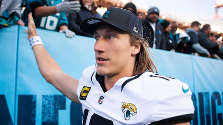 Nov 30, 2025; Nashville, Tennessee, USA;  Jacksonville Jaguars quarterback Trevor Lawrence (16) high fives the fans against the Tennessee Titans during the second half at Nissan Stadium. Mandatory Credit: Steve Roberts-Imagn Images